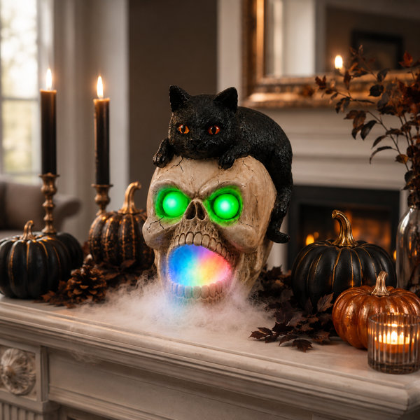 Lighted Resin Halloween Skull and Black Cat Decorative Accent with Green Eyes and Multicolor Mist Fog Maker